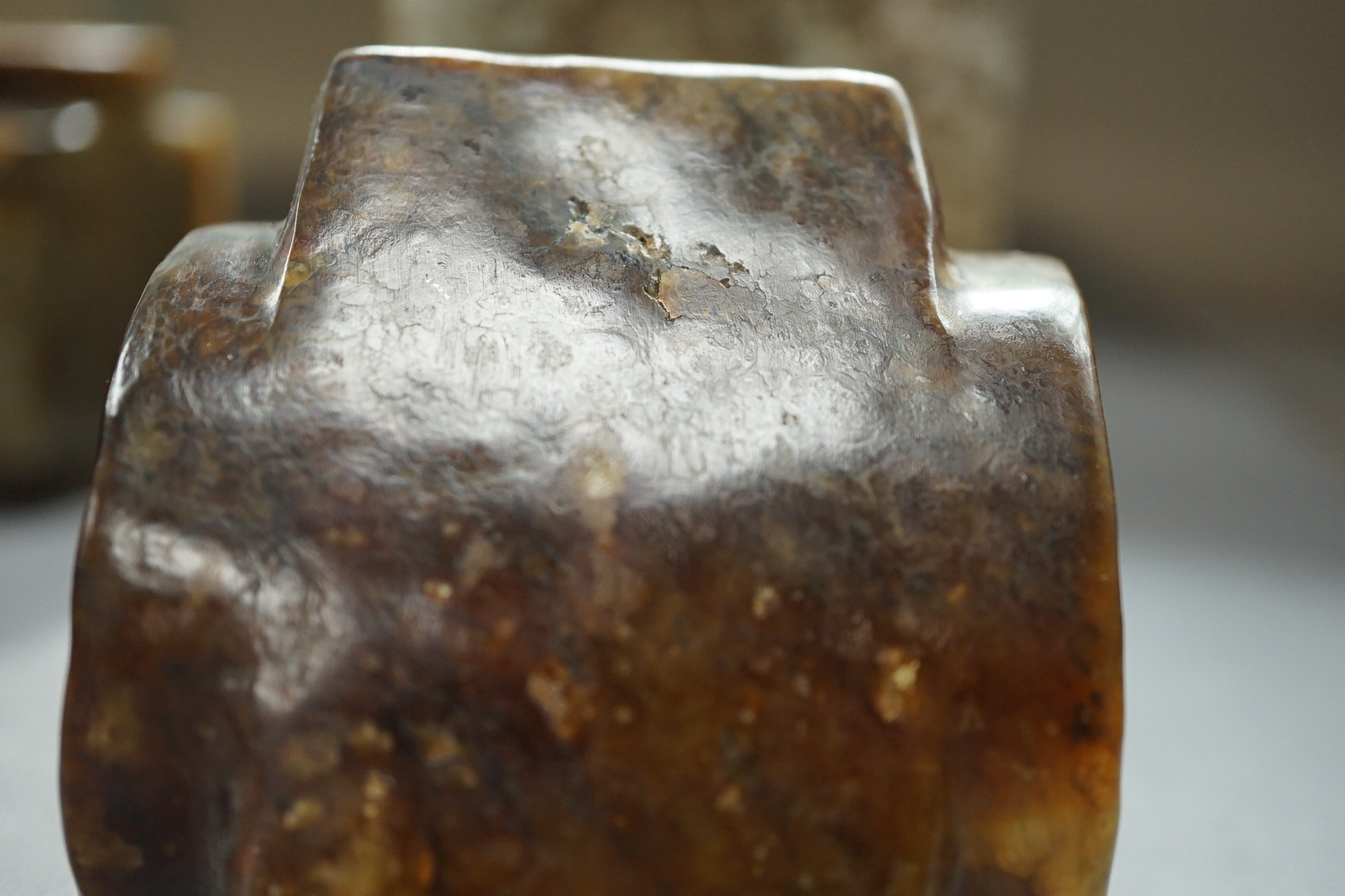 Four Chinese archaistic jade or hardstone cong